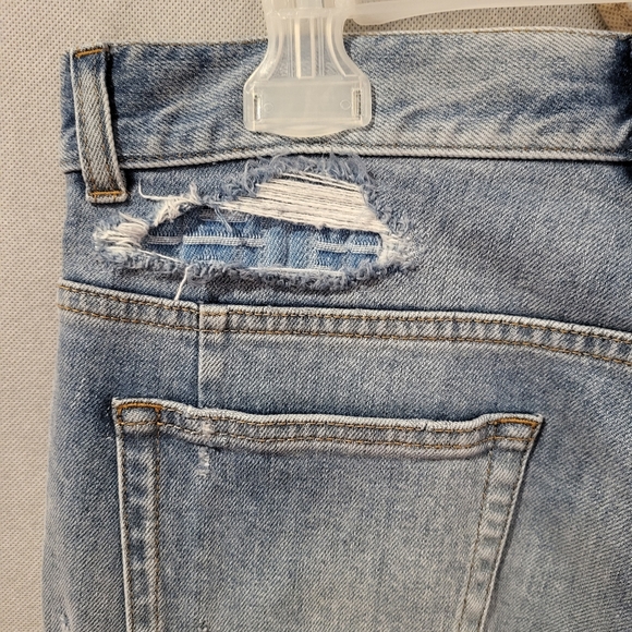 BALMAIN Slim Fit Ripped Jeans with Monogram Pattern - Picture 6 of 8